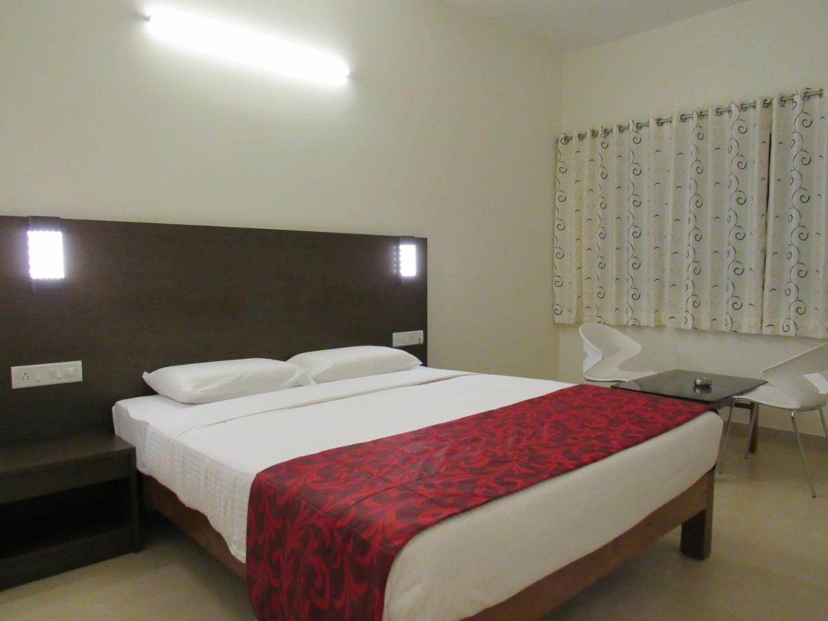 Palguni Residency Hotel Hassan Exterior photo
