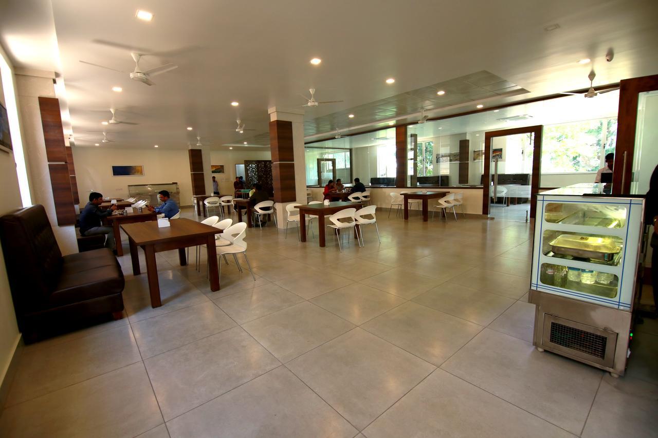 Palguni Residency Hotel Hassan Exterior photo