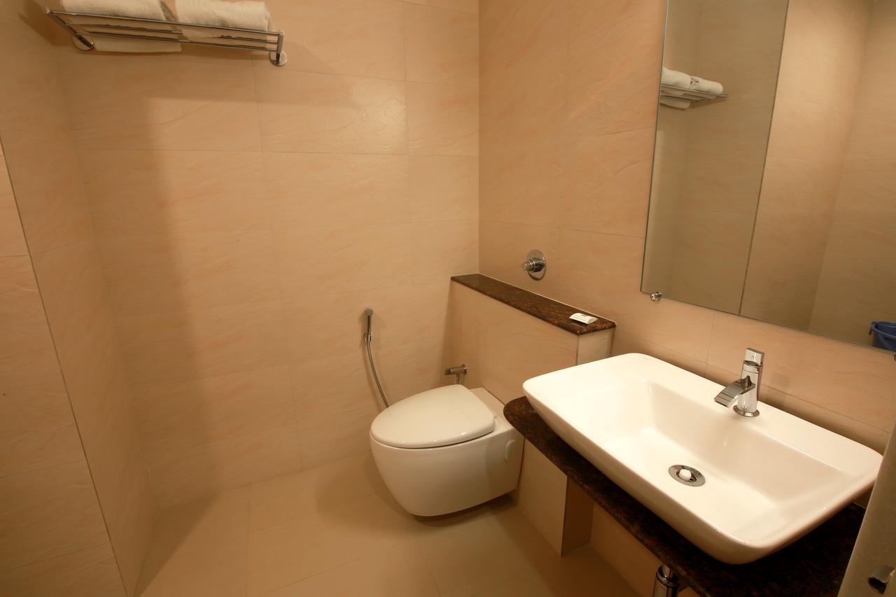 Palguni Residency Hotel Hassan Exterior photo