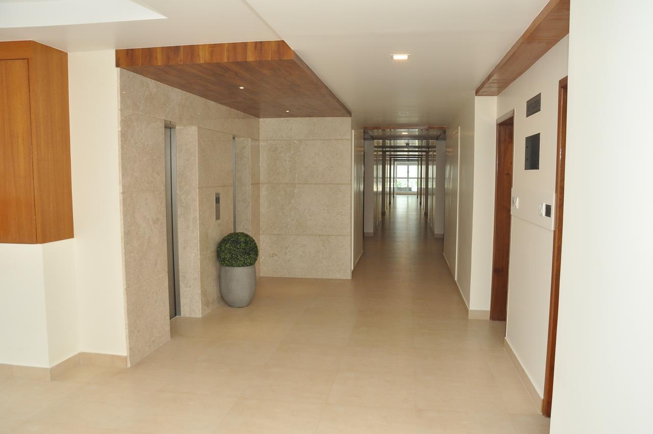 Palguni Residency Hotel Hassan Exterior photo