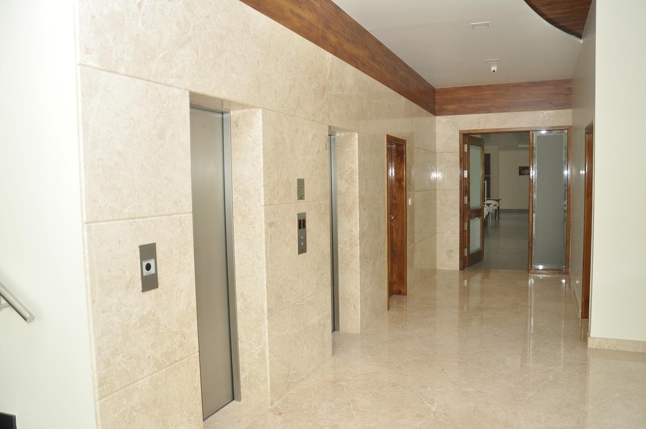 Palguni Residency Hotel Hassan Exterior photo